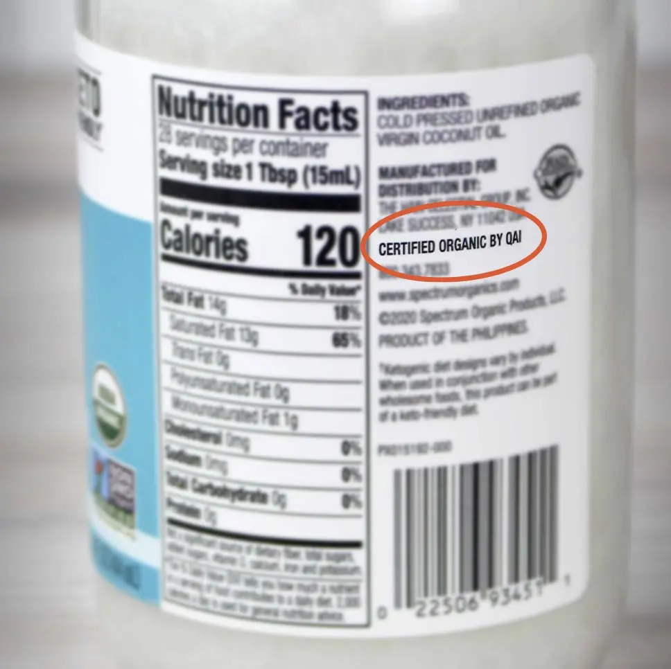 Coconut oil jar label with the line Certified Organic by QAI circled in red beside the Nutrition Facts and ingredient panels